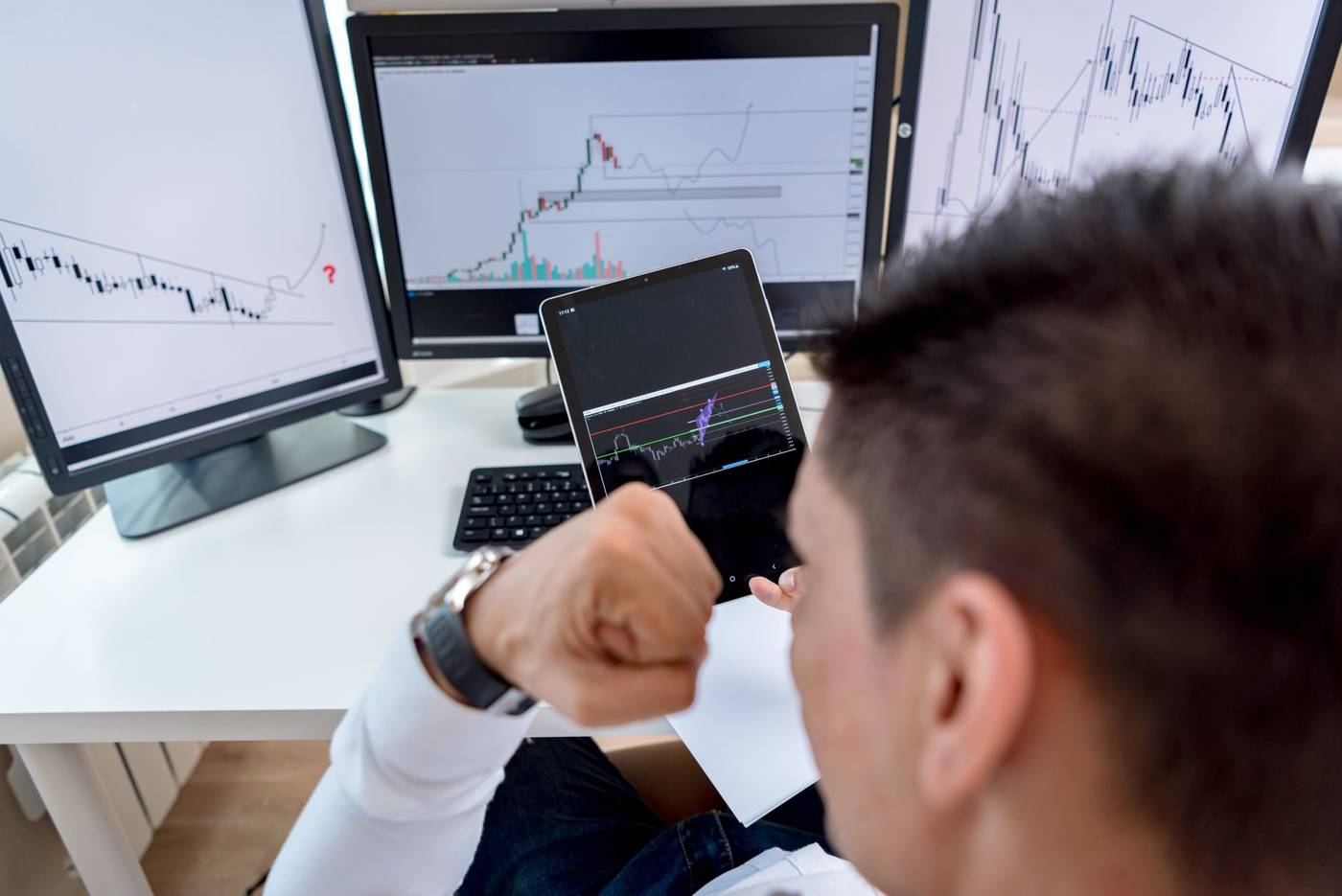Energy trader analyzing charts